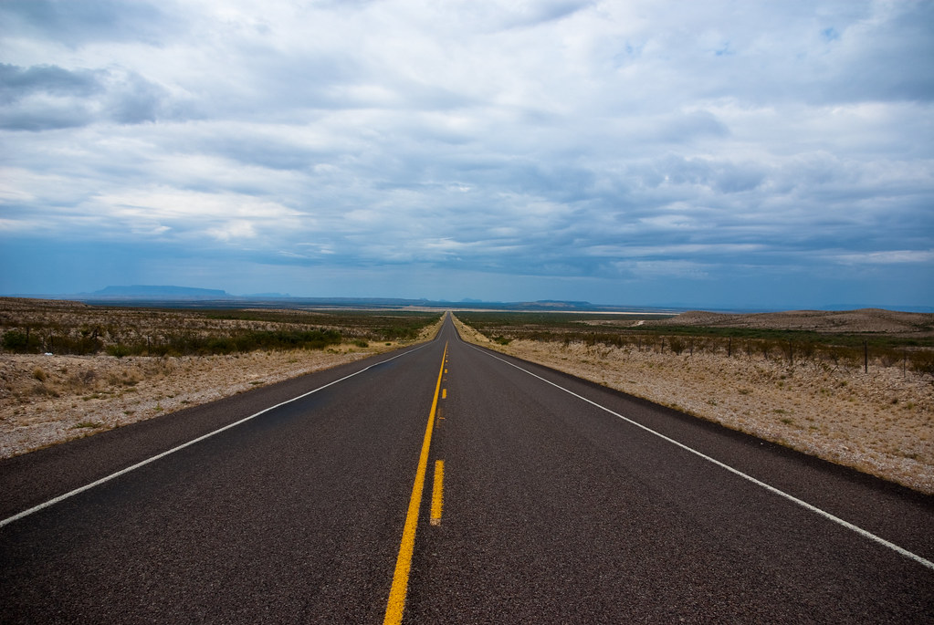 A road disappearing into the horizon